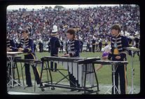 Percussion instrument section of Marching Band performing